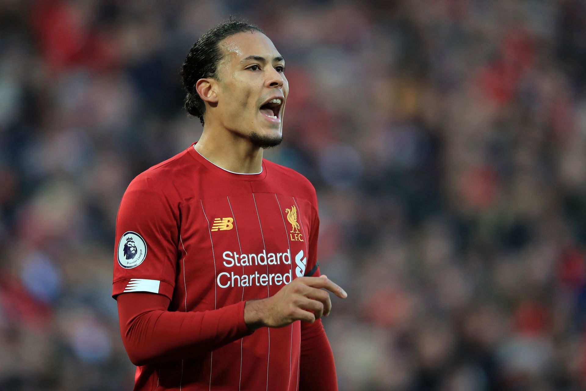 Virgil van Dijk organising his defence during Liverpool FC vs Brighton & Hove Albion game.